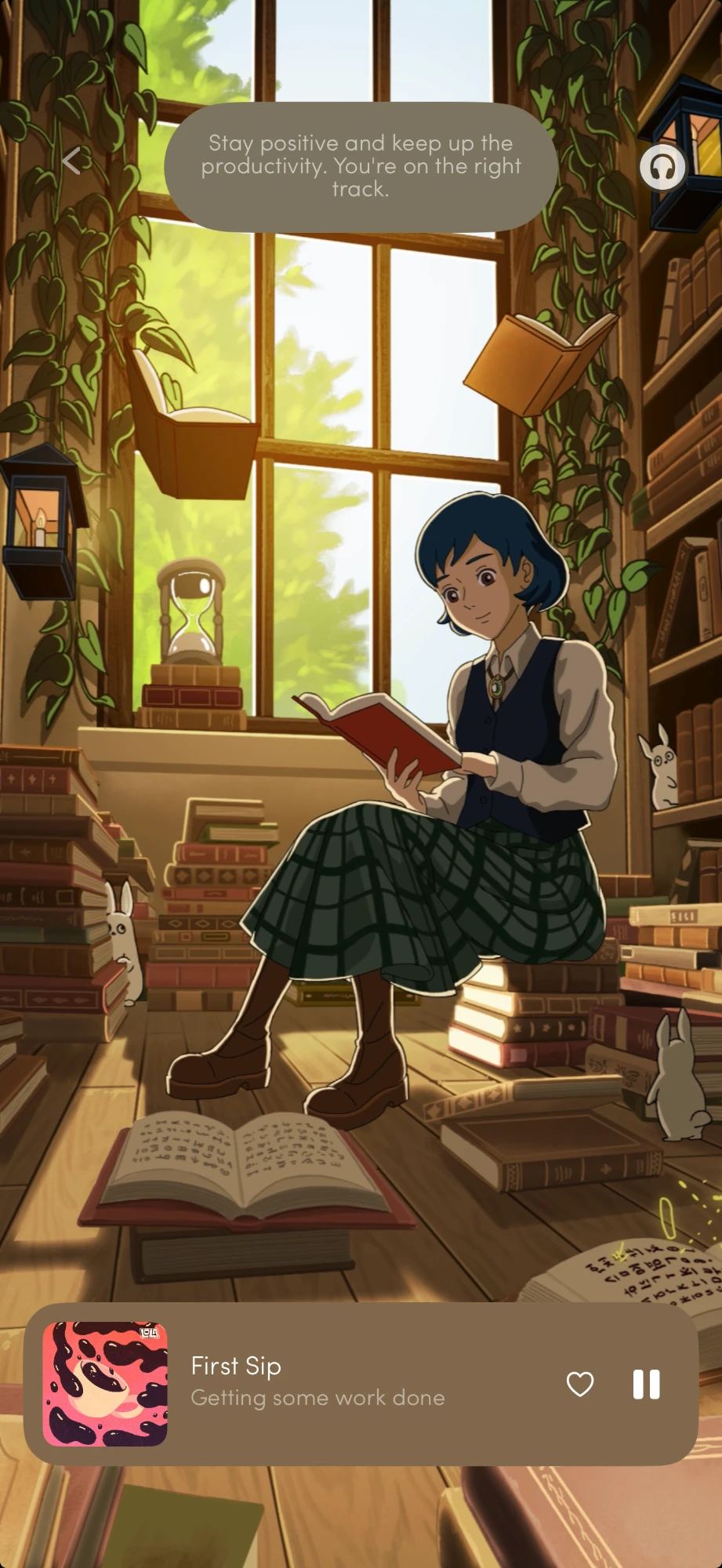 The Lola app playing “First Sip” — a girl reads in a sunlit library of stacked books, lanterns and small white rabbits, under a note that reads “Stay positive and keep up the productivity. You’re on the right track.”