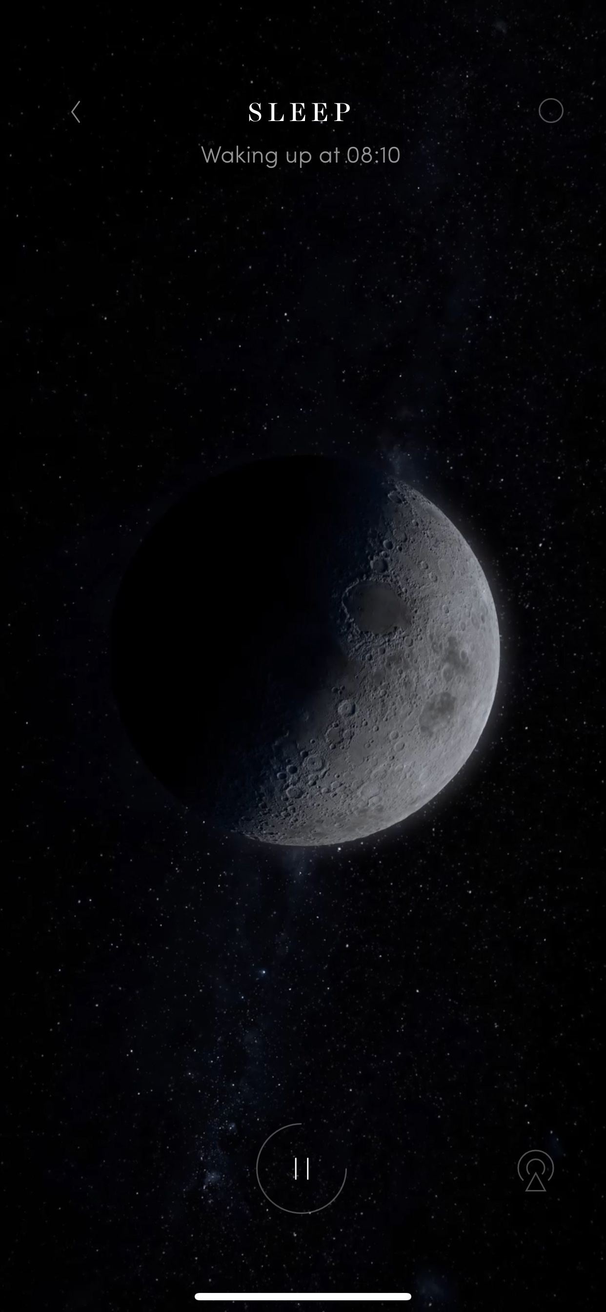 The SLEEP app at night — a half-lit moon over a field of stars, set to wake at 08:10.